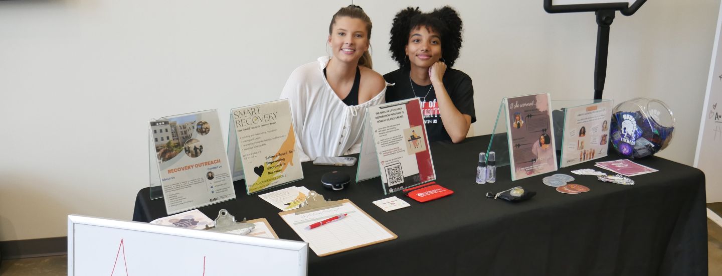 Two students sitting at a table